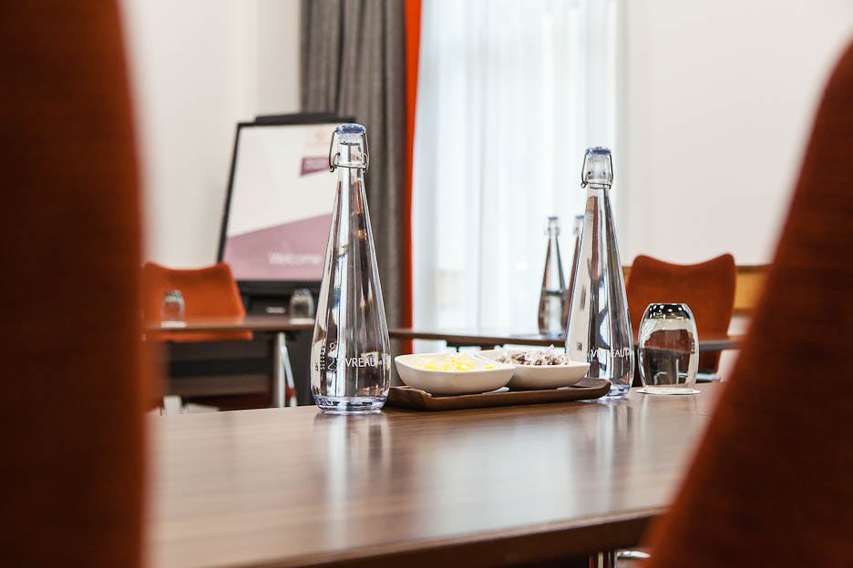 Meeting room 1 at Clayton Hotel Leeds with polished table, ideal for professional events.