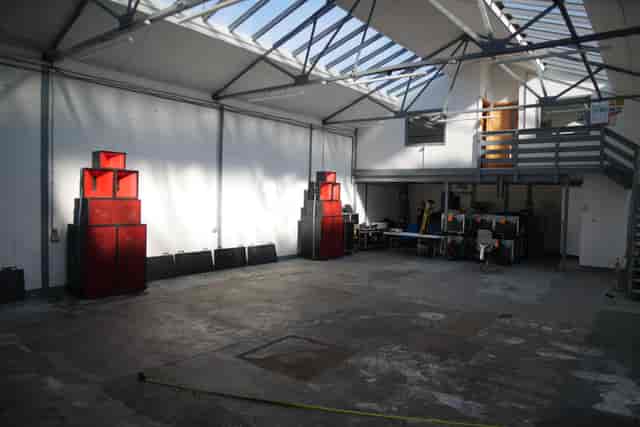 Bright industrial venue with high ceilings for meetings and workshops in North-East London.