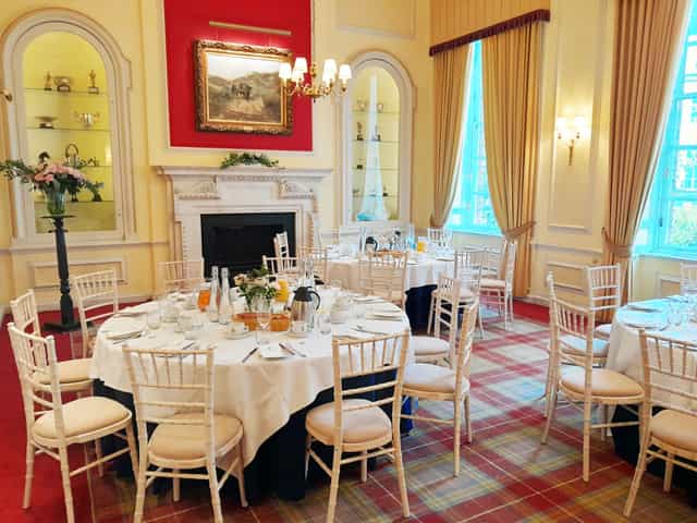 Caledonian Club breakfast event, tartan carpet, Chiavari chairs