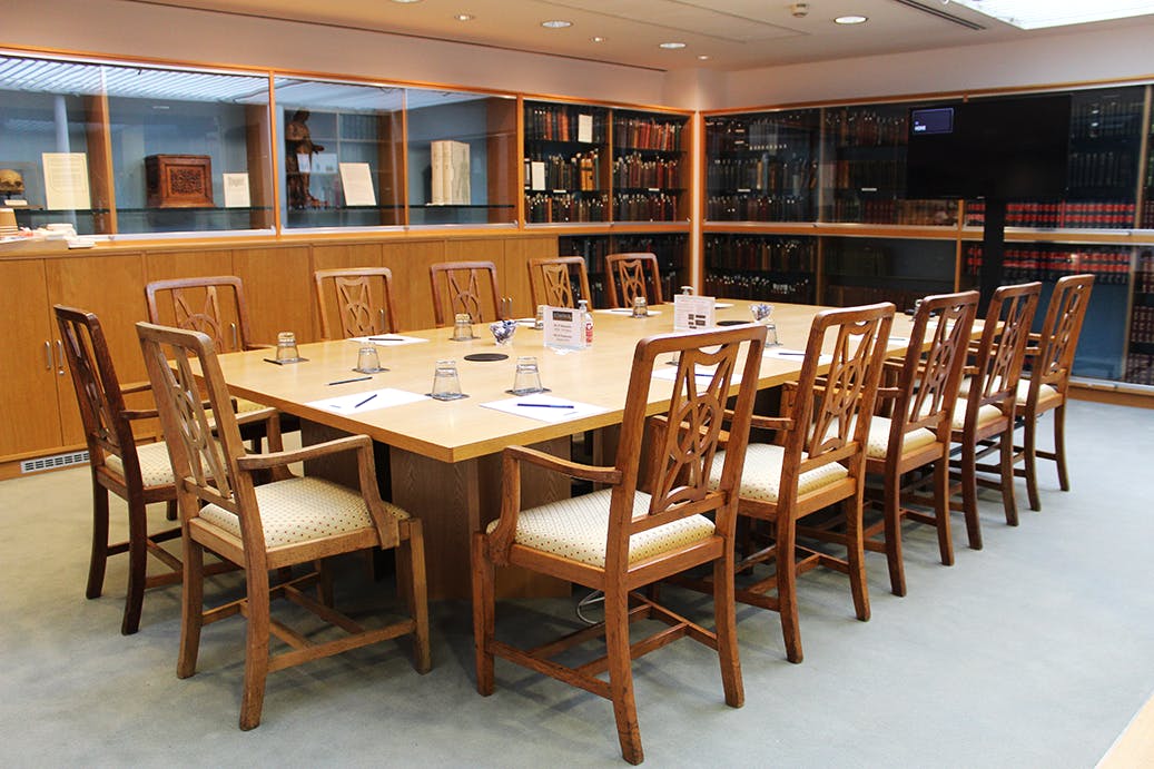 Heritage Centre conference room with glass walls, ideal for professional meetings and events.