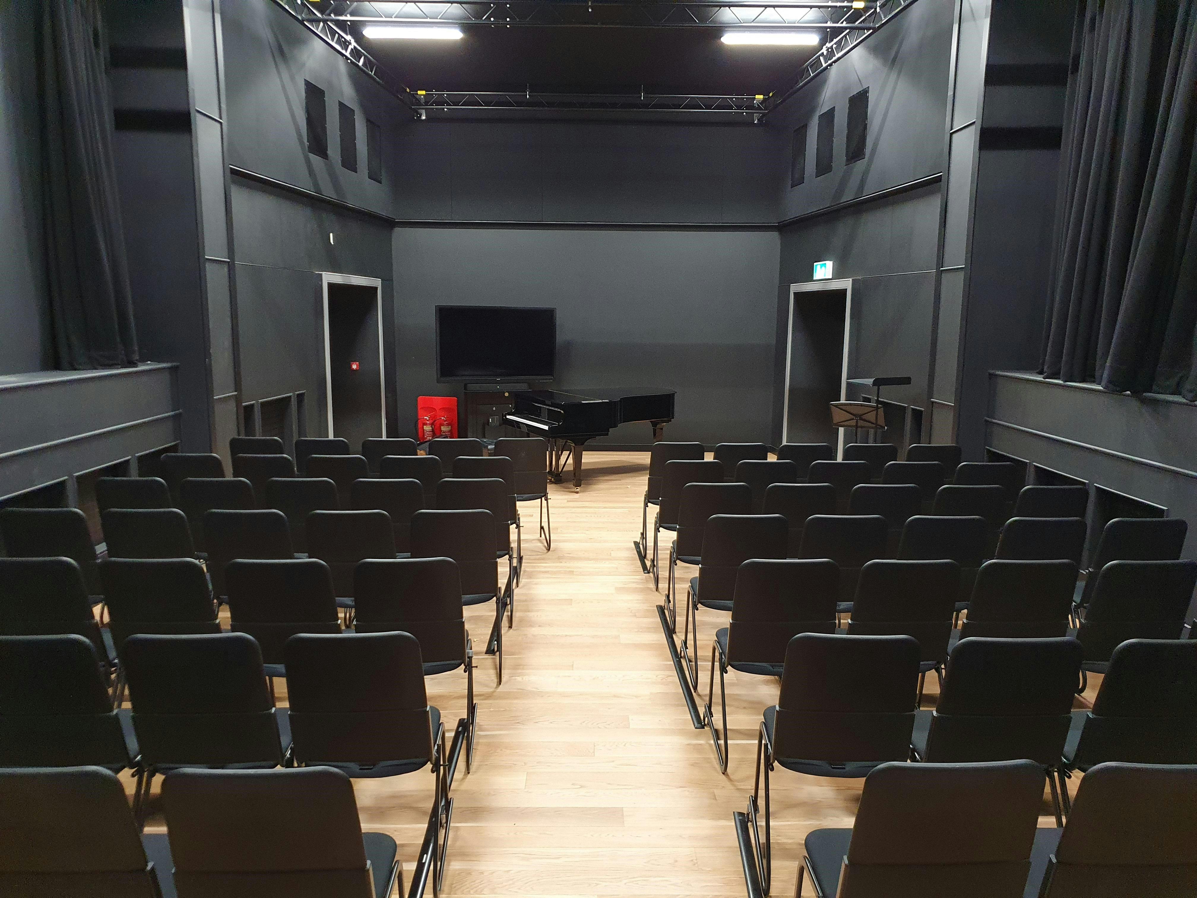 Performance Studio at Royal College of Music: modern event space with grand piano.