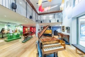 RCM Museum event space with modern design and historical instruments for creative gatherings.