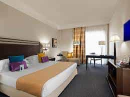 Spacious meeting room at Crowne Plaza Rome, ideal for conferences and business events.