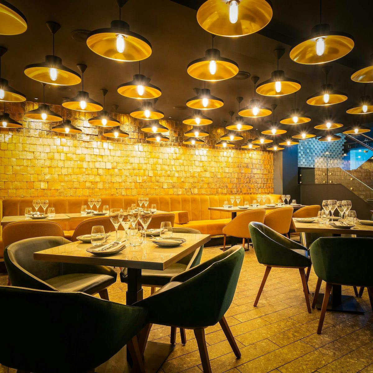 Stylish dining space in Farzi London, ideal for networking dinners and private events.