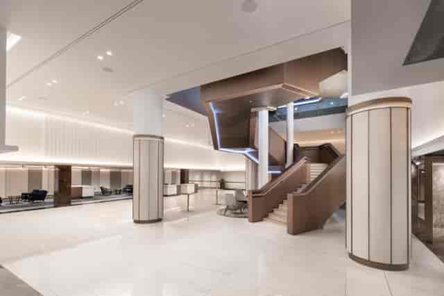 West Wing Foyer Meeting Rooms at Hilton London Metropole, elegant staircase, event venue.