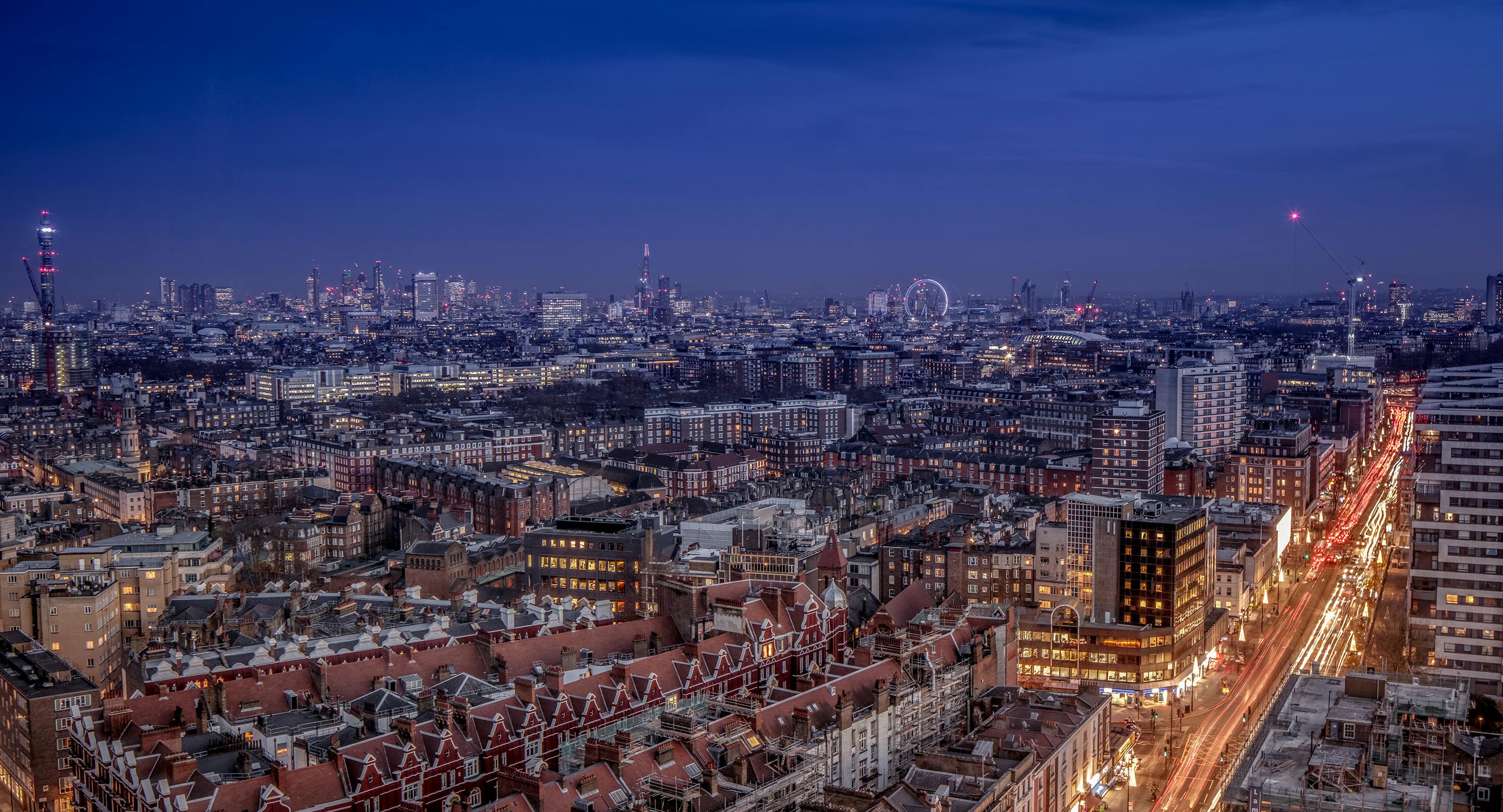 Panoramic city skyline view from Room 23, ideal for networking events and conferences.