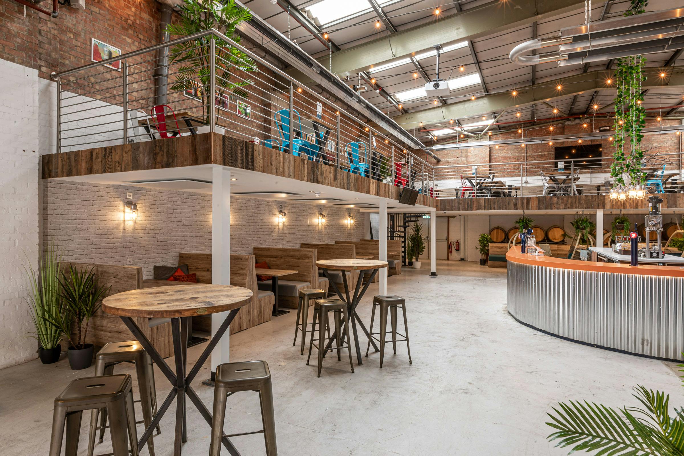 Fourpure Taproom event space with industrial-chic design, ideal for networking and gatherings.