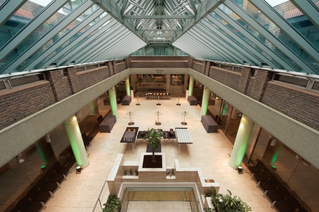 Max Rayne Atrium with glass ceiling, perfect for networking and social events.