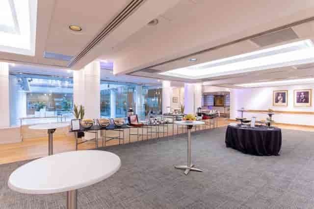 Cavendish Room event space with high-top tables, perfect for networking receptions.