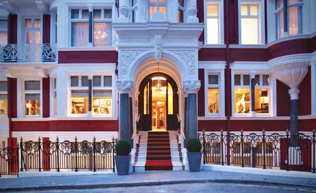 Elegant Mayfair Suite entrance in Althoff St. James's Hotel, ideal for corporate events and receptions.