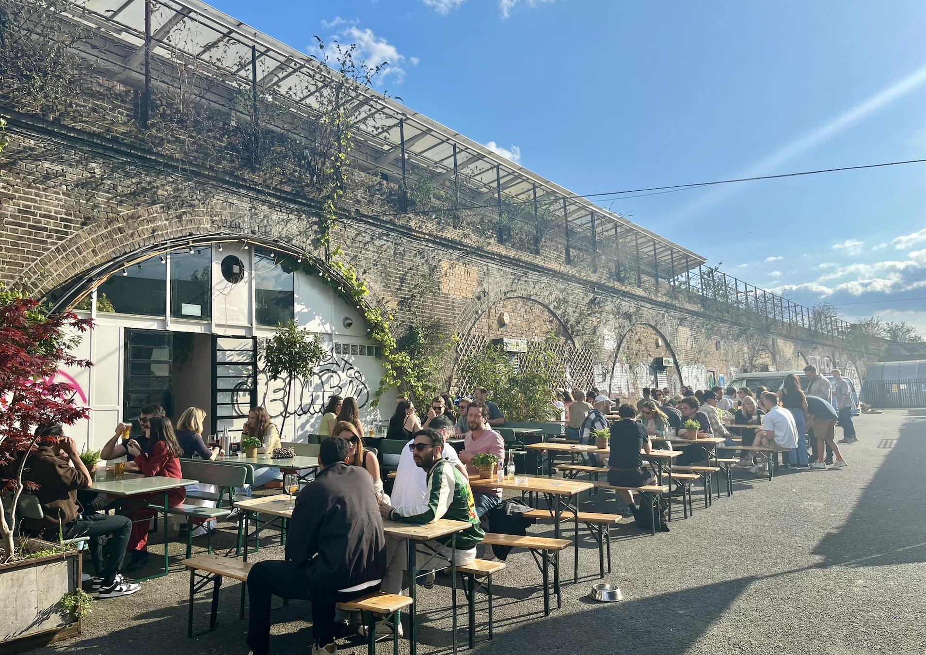 Vibrant outdoor event space in Peckham Arches for casual gatherings and networking.