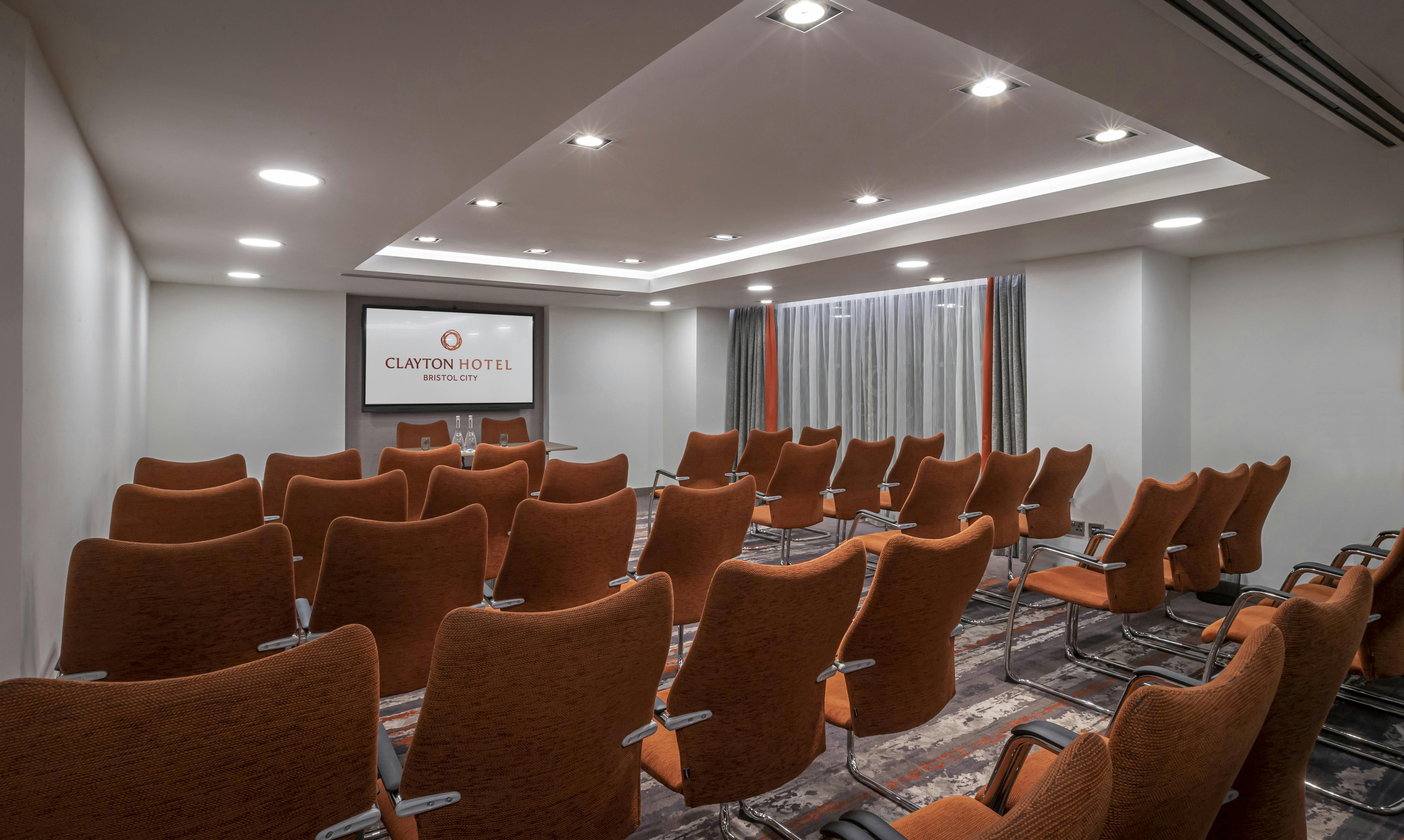 Modern meeting room at Clayton Hotel Bristol, ideal for corporate events and workshops.