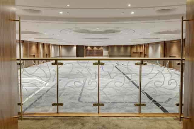 Kensington Suite at Hilton London Metropole, spacious event space with balcony view.
