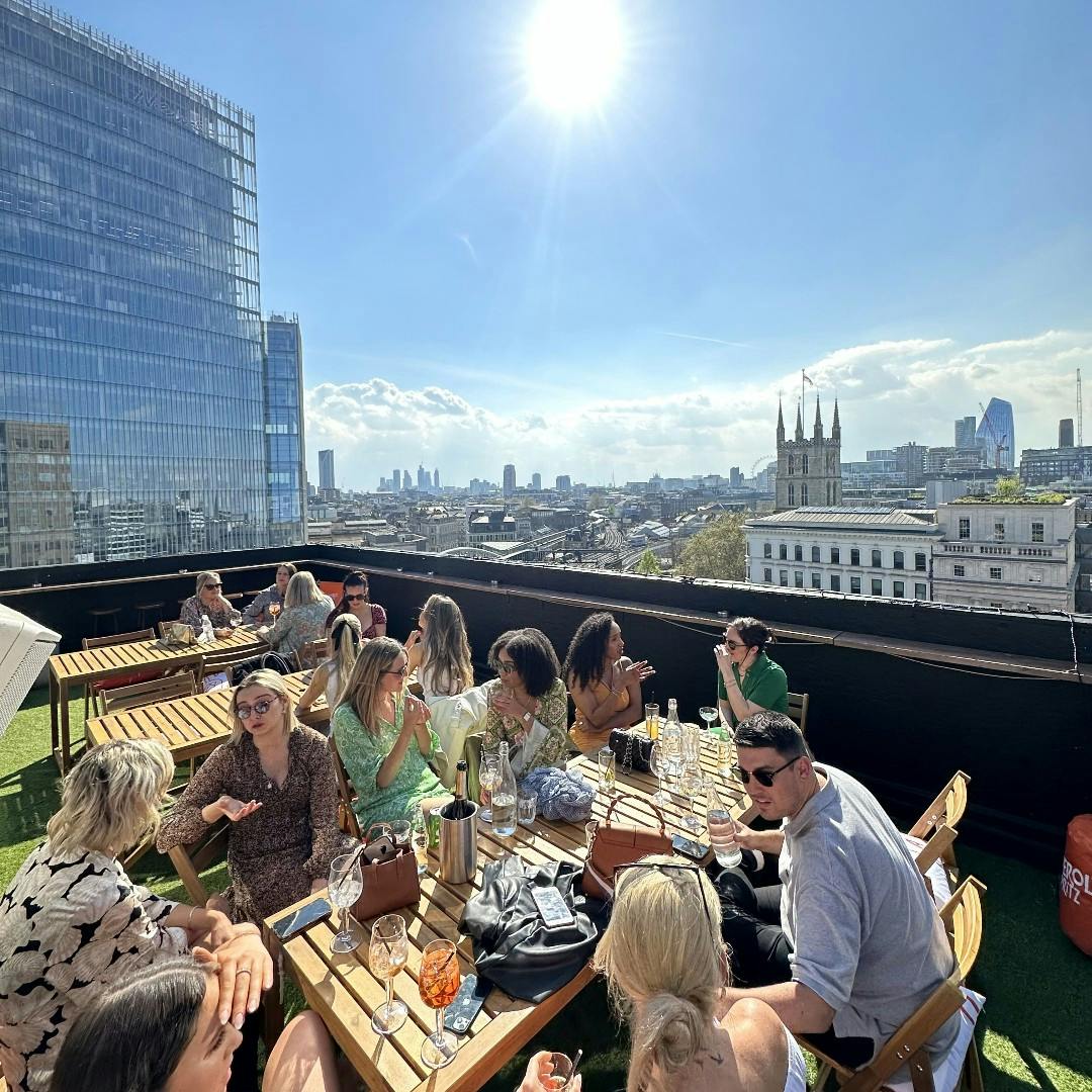 Vibrant London Bridge Rooftop gathering with city views, ideal for networking events.