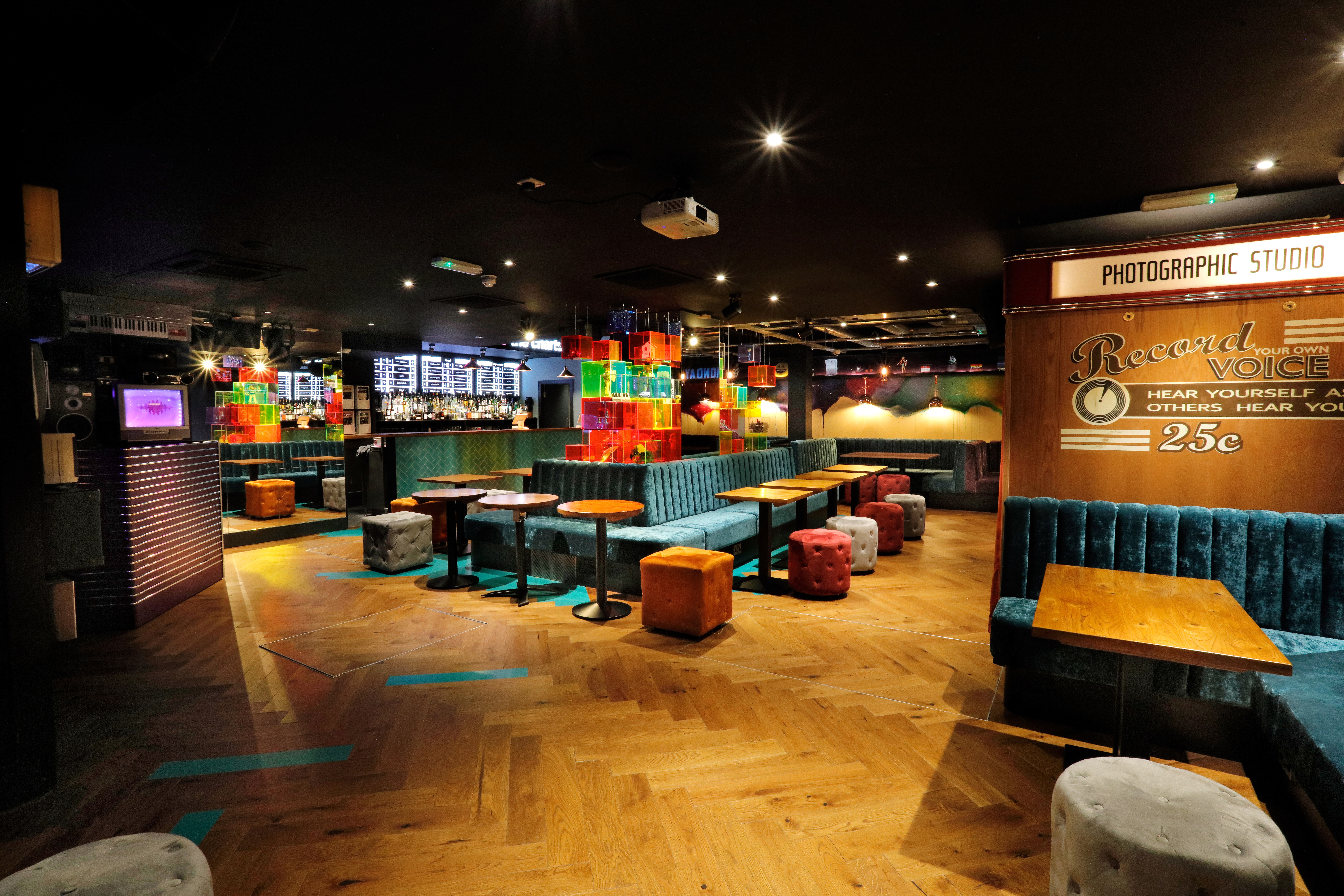 Vibrant event space at Lucky Voice Holborn, perfect for gatherings and meetings. - Banner