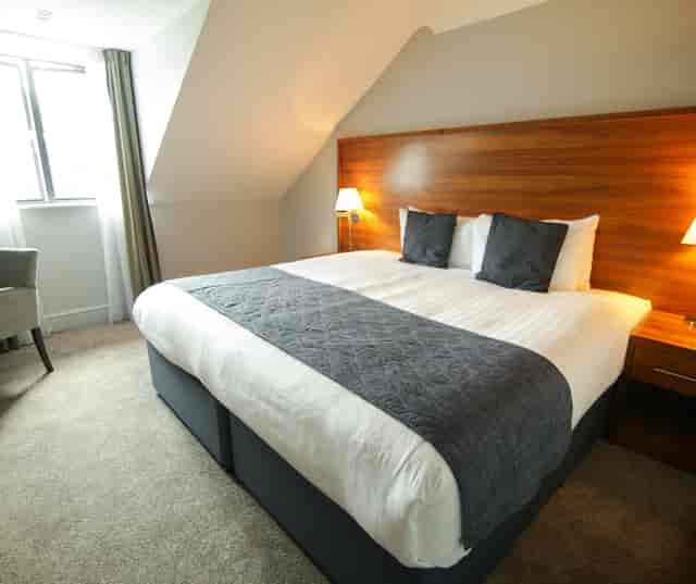 Modern hotel room at Old Thorns, perfect for business events and conferences.