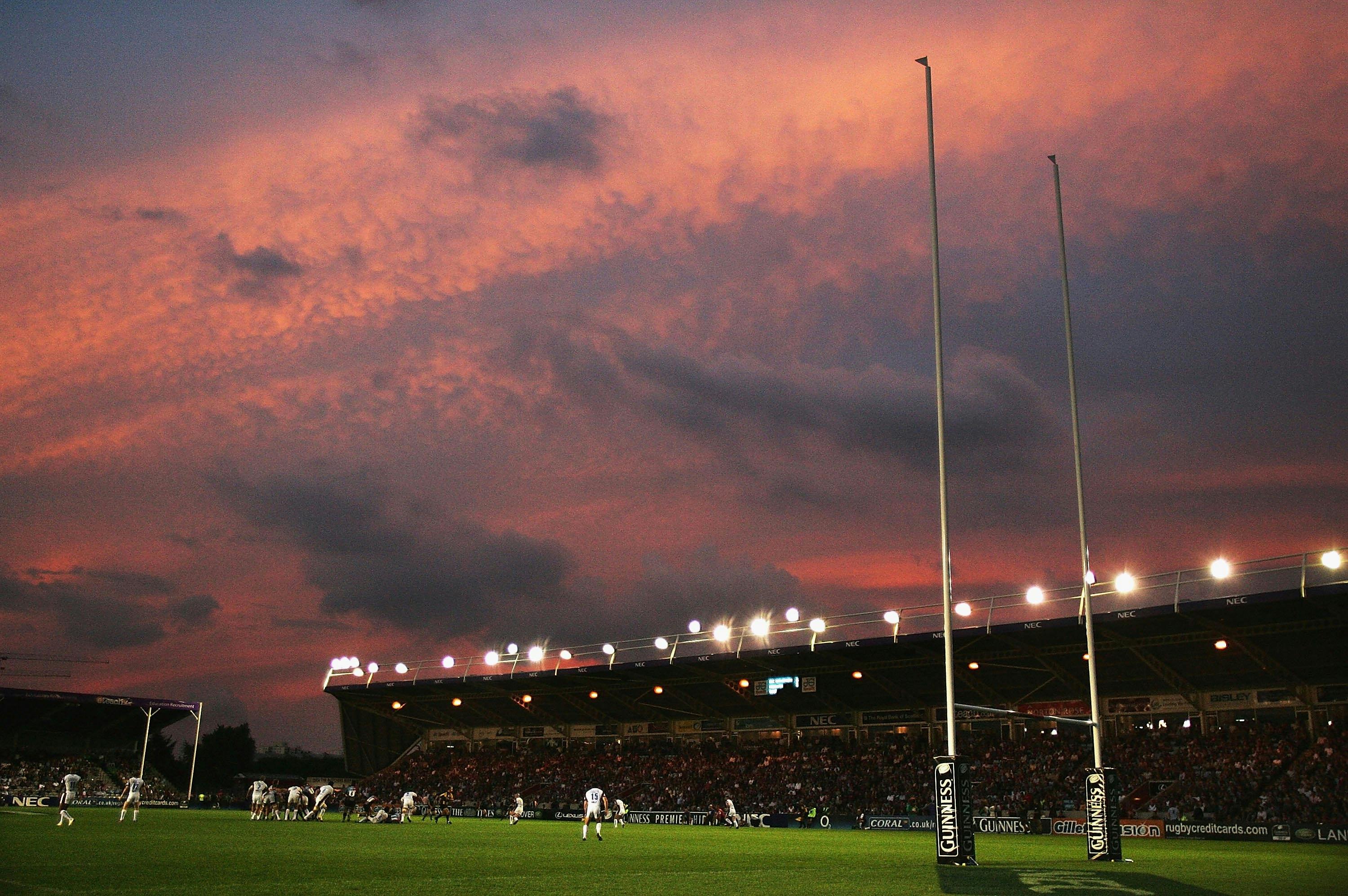 Vibrant sunset over Twickenham Stoop Stadium, ideal for sports events and hospitality.