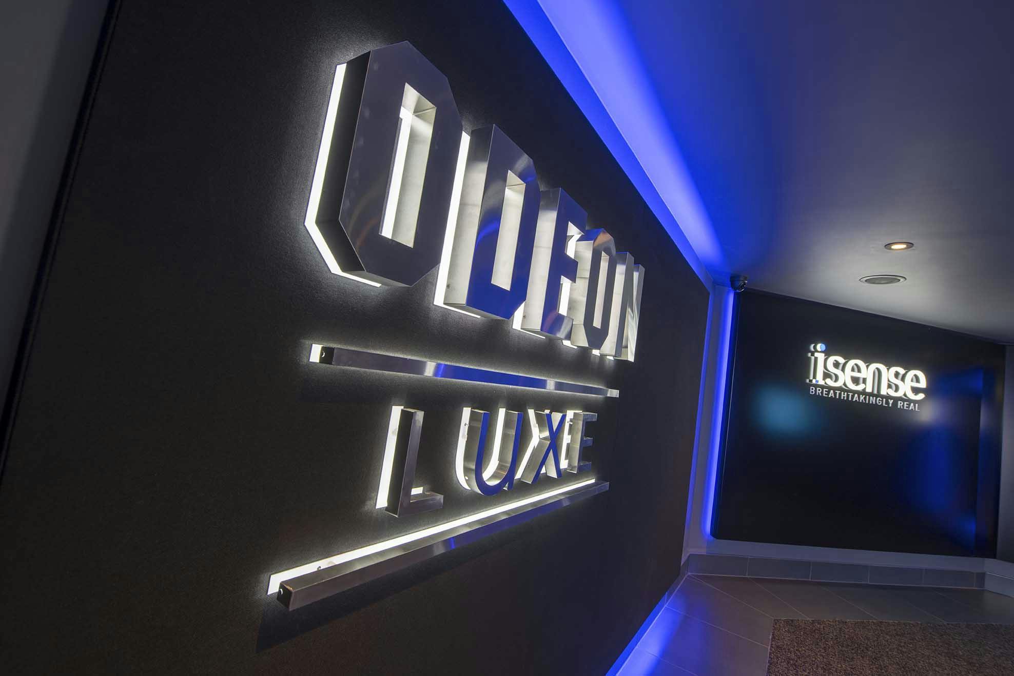 Odeon Luxe Birmingham entrance with illuminated signage for upscale events and screenings.