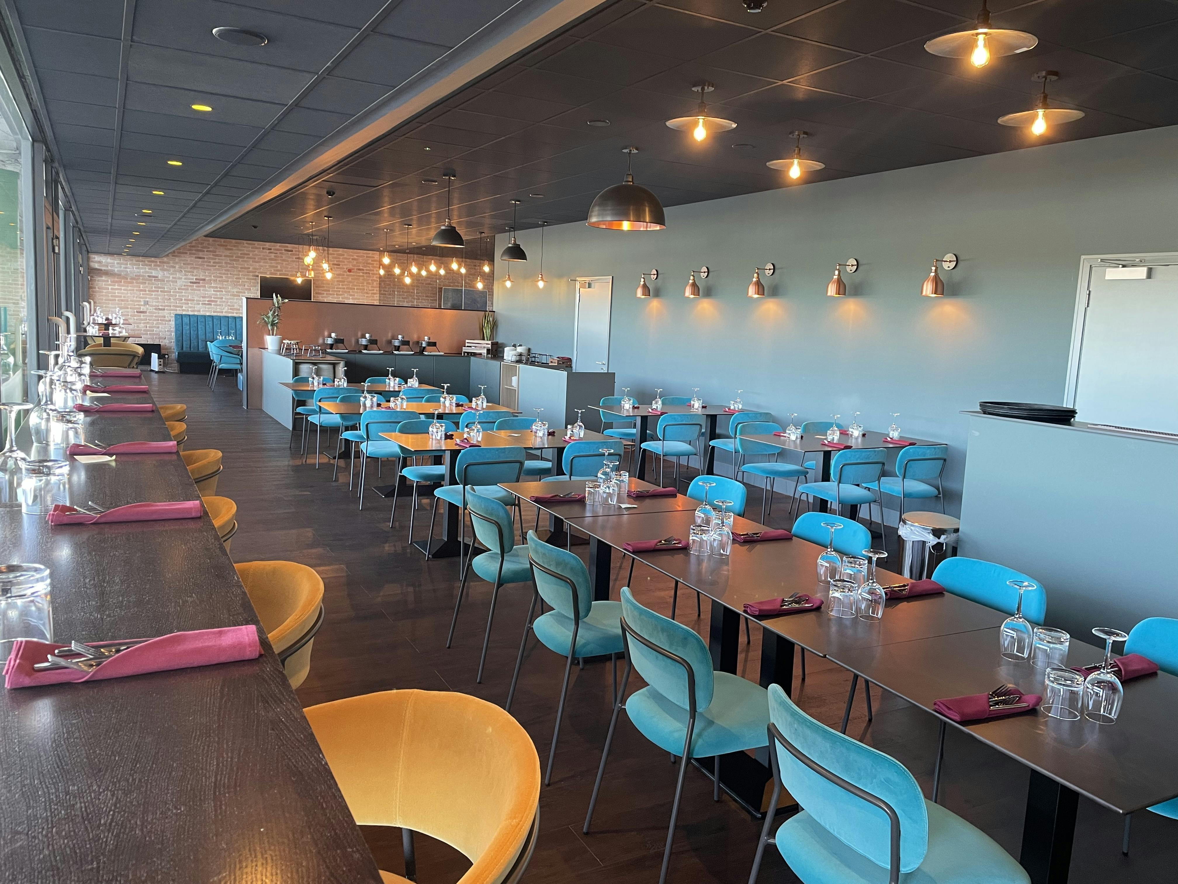 Modern dining space at The Twickenham Stoop Stadium, ideal for events and gatherings.