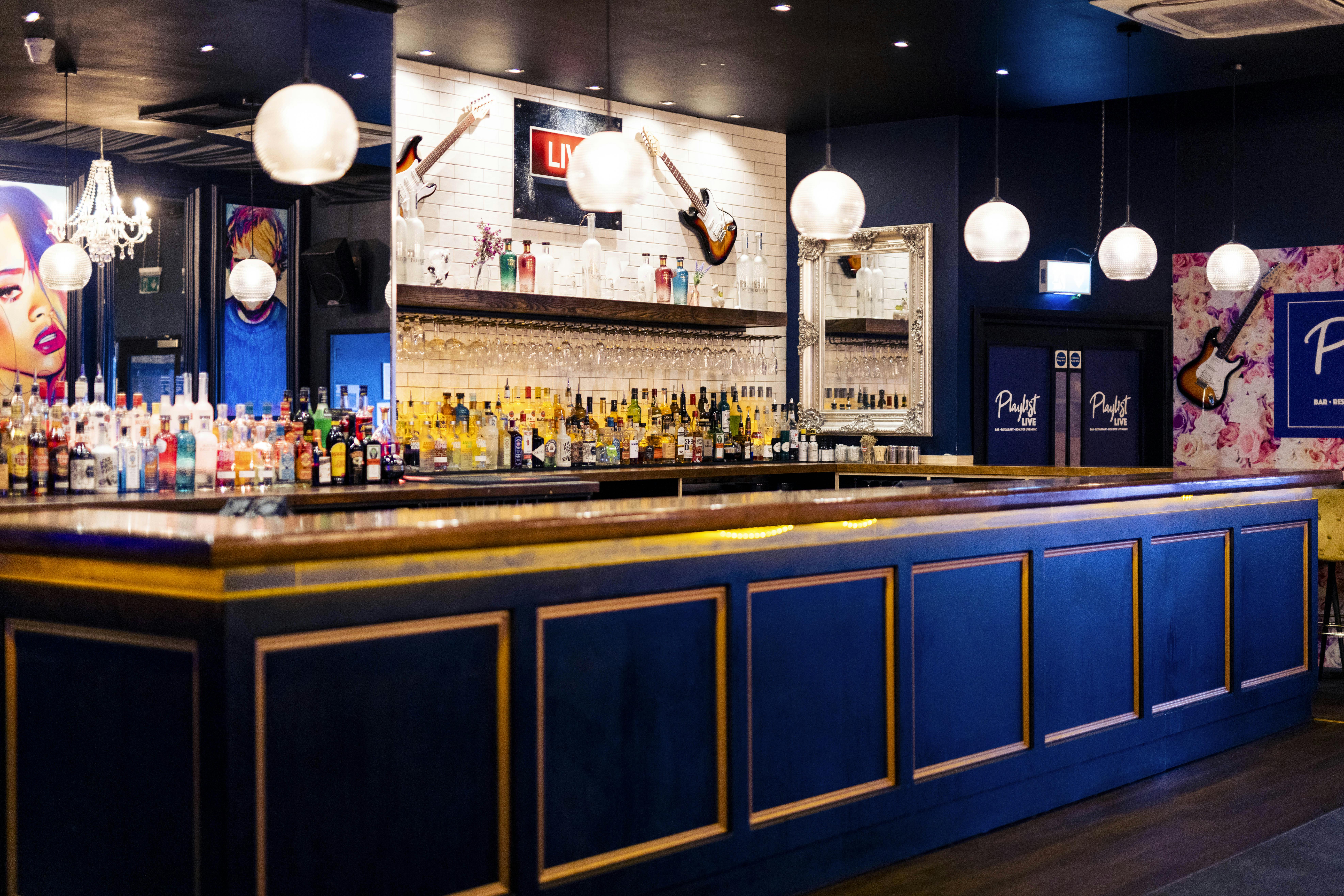 Stylish bar area at Exclusive Venue Hire for networking events and cocktail receptions.