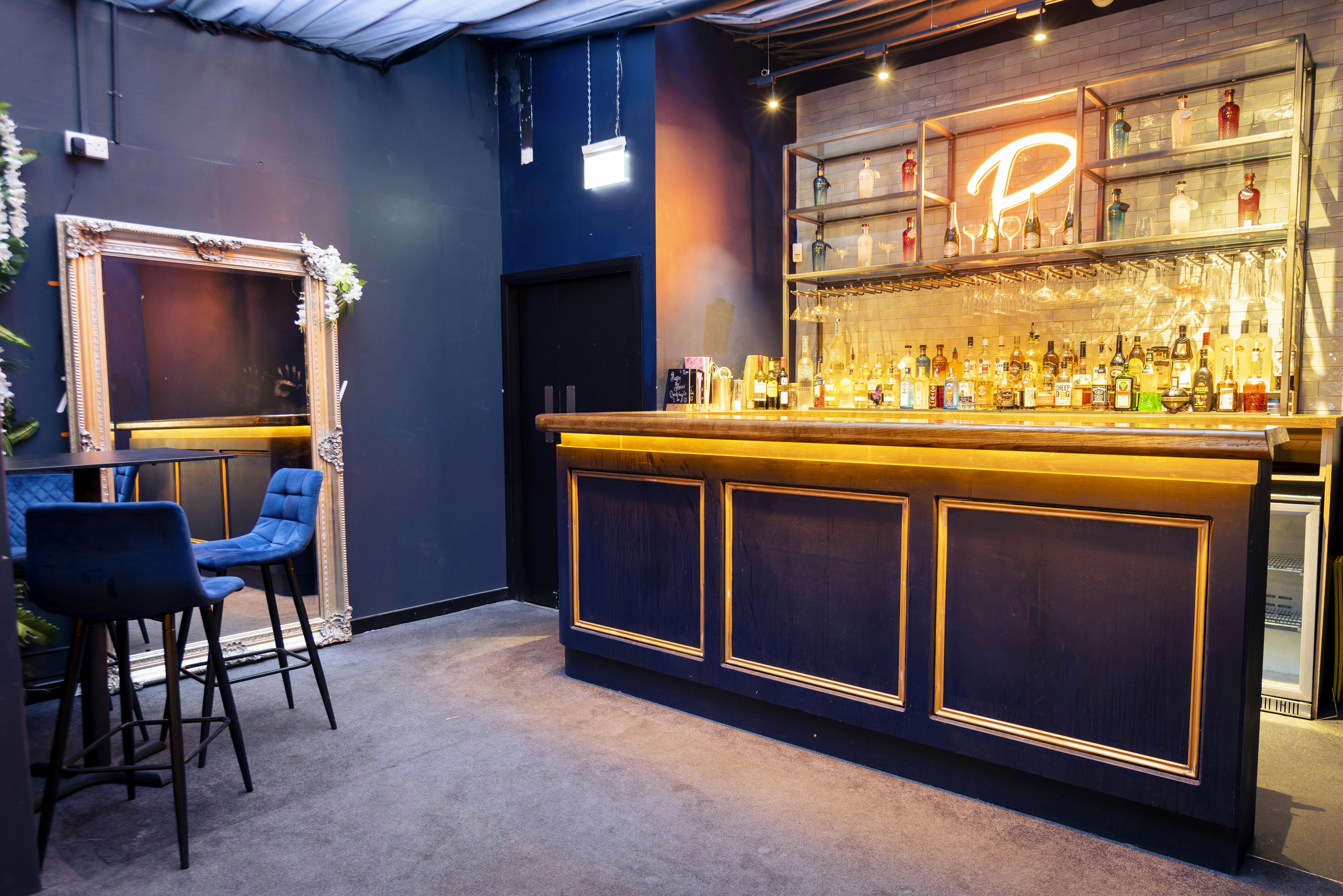 Sleek modern bar setup for events at Exclusive Venue Hire, Playlist Live.