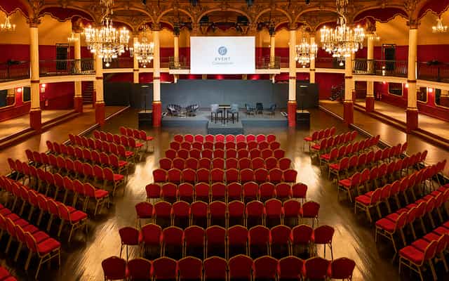 Elegant event space at Salle Wagram with tiered seating for conferences and galas.