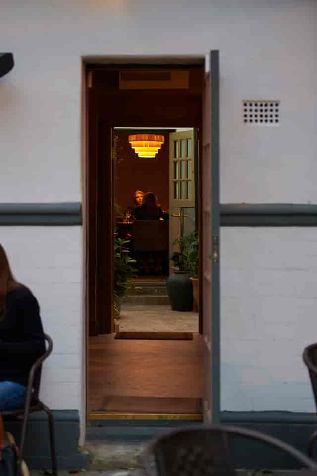 Intimate dining setting at Private Snug, ideal for small meetings and events.