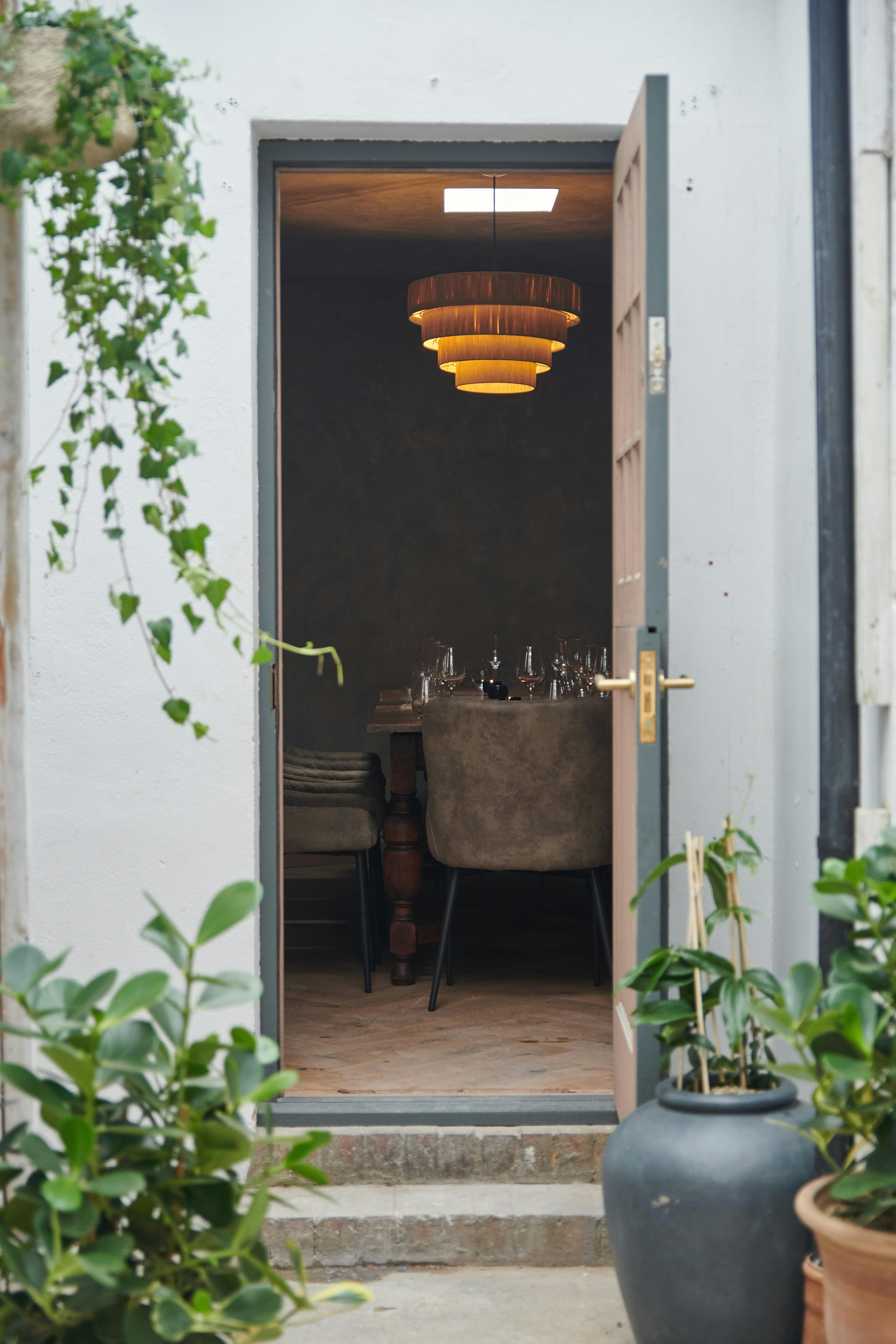 Private dining space with elegant table setting, ideal for intimate gatherings and meetings.