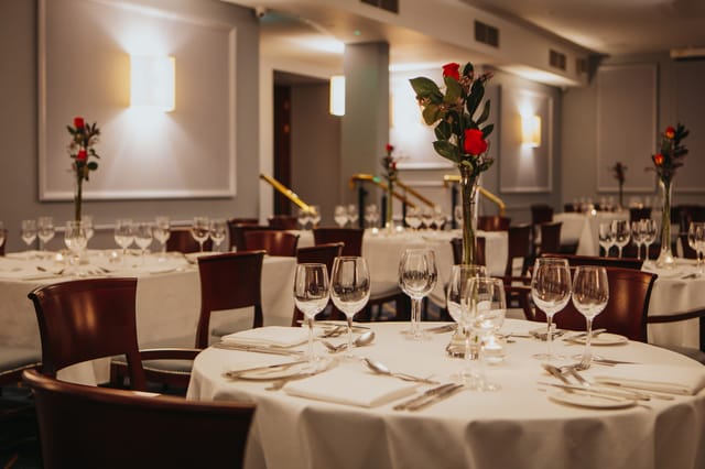 Elegant dining room in Tara Suite 1, Grand Hotel, ideal for formal events and galas.