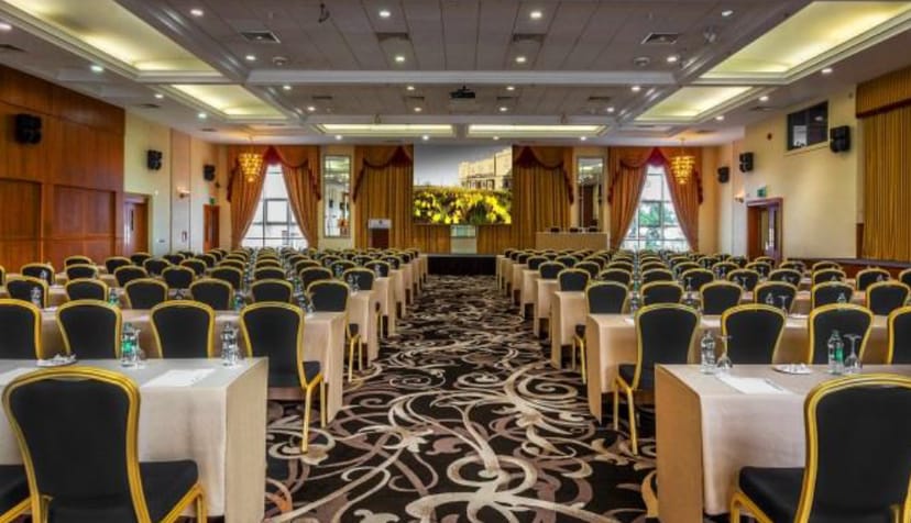 Tara Suite 1 conference room with elegant decor, perfect for corporate meetings and events.