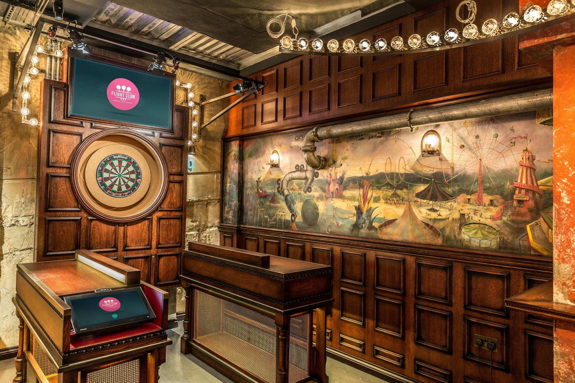 Stylish event space at Flight Club Bloomsbury with dartboard, ideal for networking and team-building.