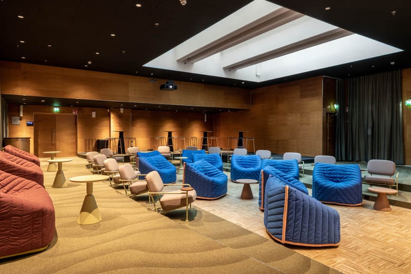 Modern meeting space in Scandic Helsinki with flexible seating for corporate events.