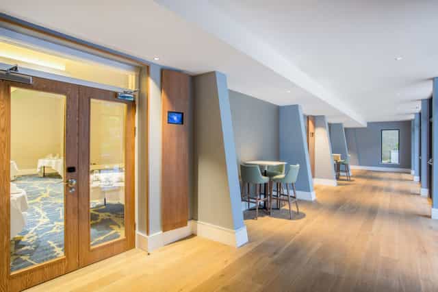 Gerrards Suite corridor at Crowne Plaza, modern decor for meetings and networking events.