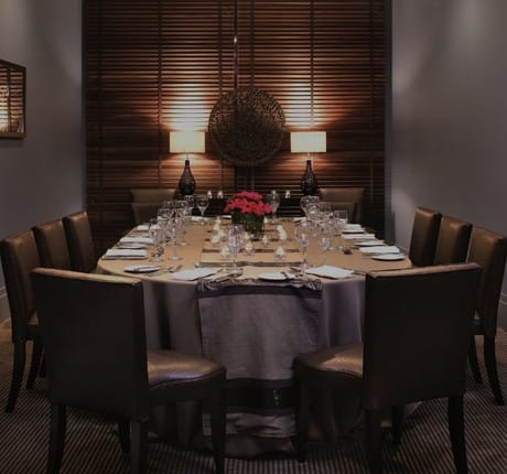Elegant Sky Lounge dining setup for intimate corporate dinners and meetings.