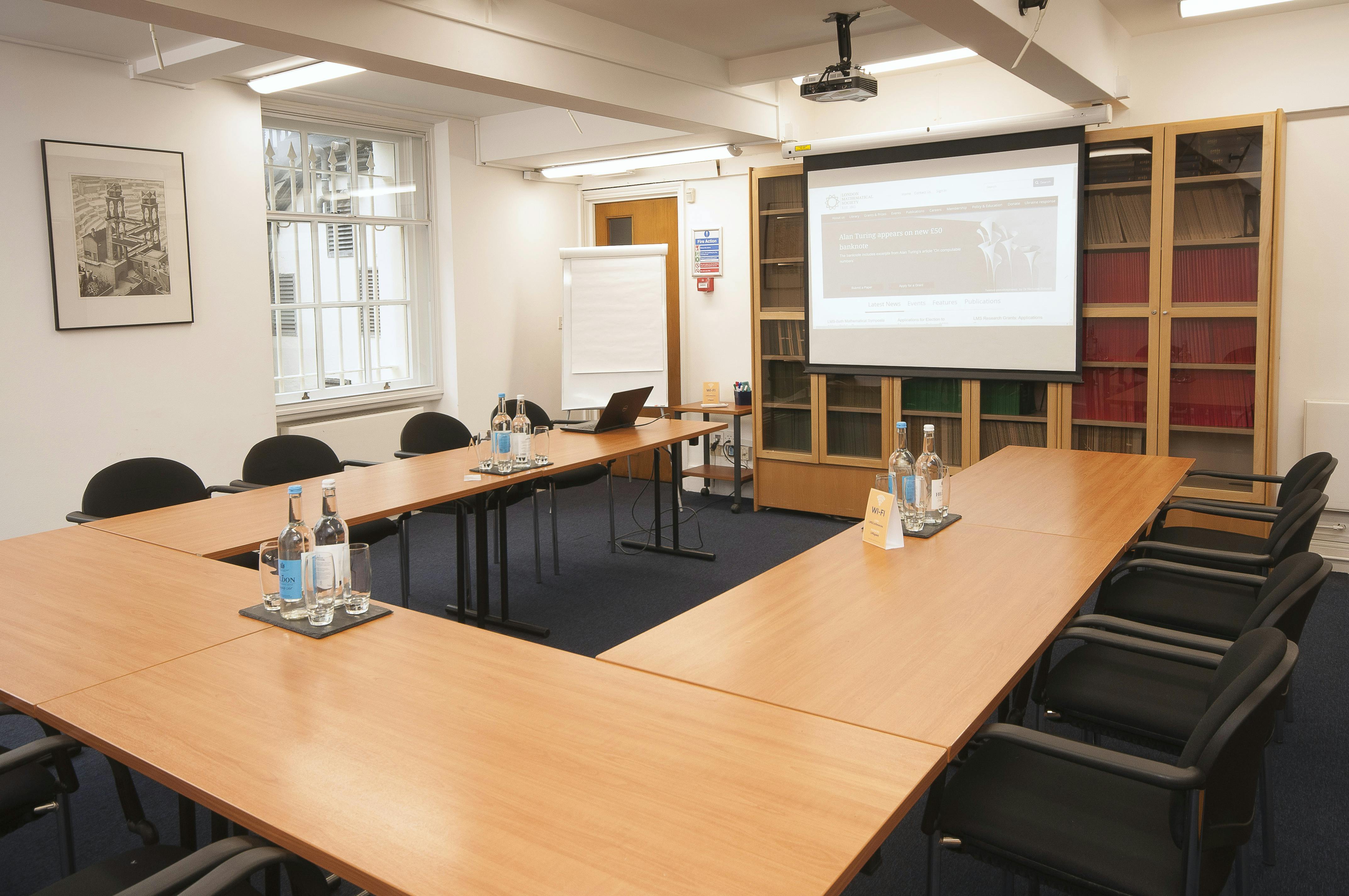 Cayley Room at De Morgan House: professional meeting space with large table, ideal for workshops.