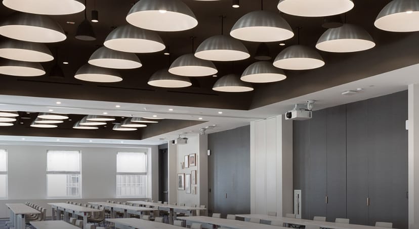 Modern meeting space at Convene 75 Rockefeller Plaza, ideal for workshops and presentations.