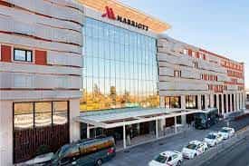 Modern Marriott hotel facade in Madrid, ideal for meetings and events.