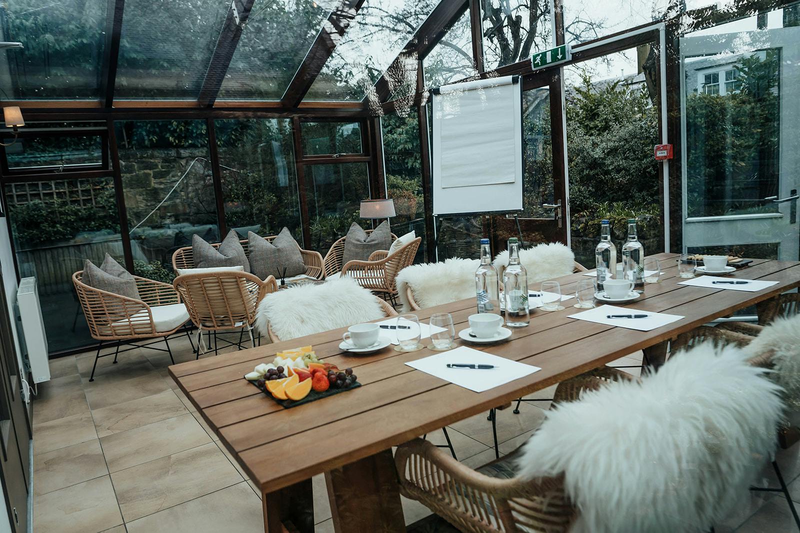 Stylish meeting space at Club Prive Conservatory, ideal for workshops and gatherings.