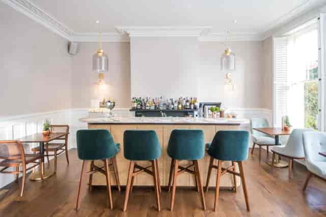 Stylish bar area at Henrietta Bar & Garden, ideal for cocktail receptions and networking events.