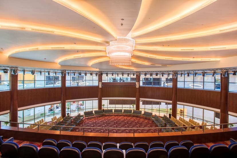 Modern circular event space at Crowne Plaza Riyadh for conferences and workshops.
