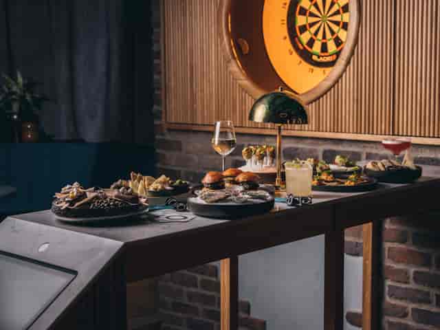 VIP Room at Oche The Strand with stylish food display for networking events and cocktail parties.