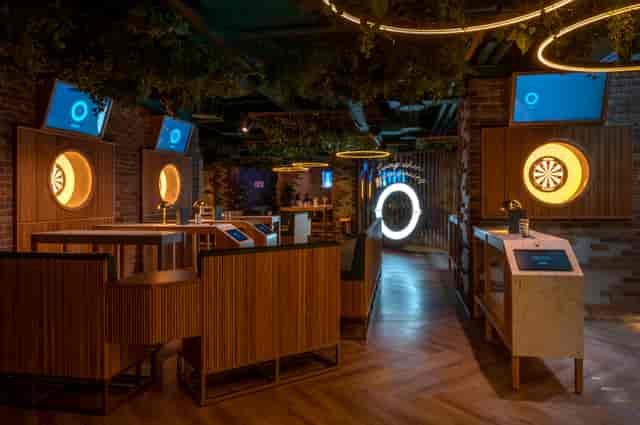Modern event space in Göteborg Oche with dartboards, ideal for corporate functions and mixers.