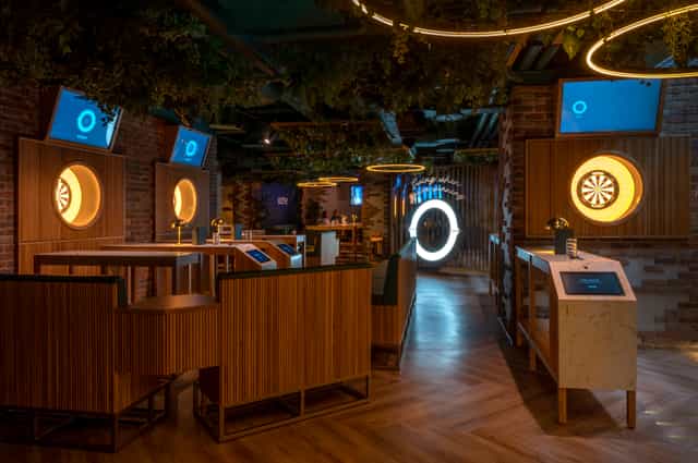 Modern event space in Göteborg Oche with dartboards, ideal for corporate functions and mixers.