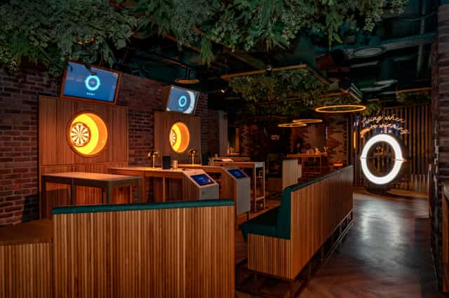 Modern event space in Göteborg Oche with stylish dartboards for networking and team-building.