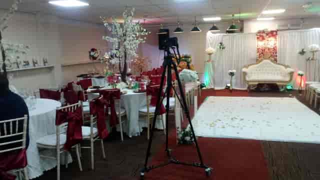 Elegant event space at P2 Centre with floral backdrop for weddings and gatherings.