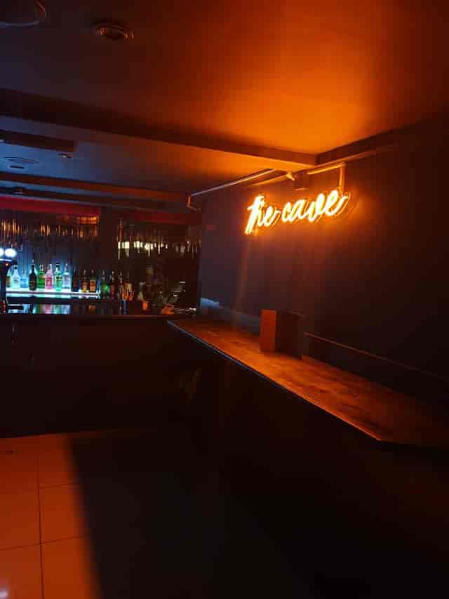 Miniature Restaurant bar with neon sign, ideal for intimate gatherings and networking events.
