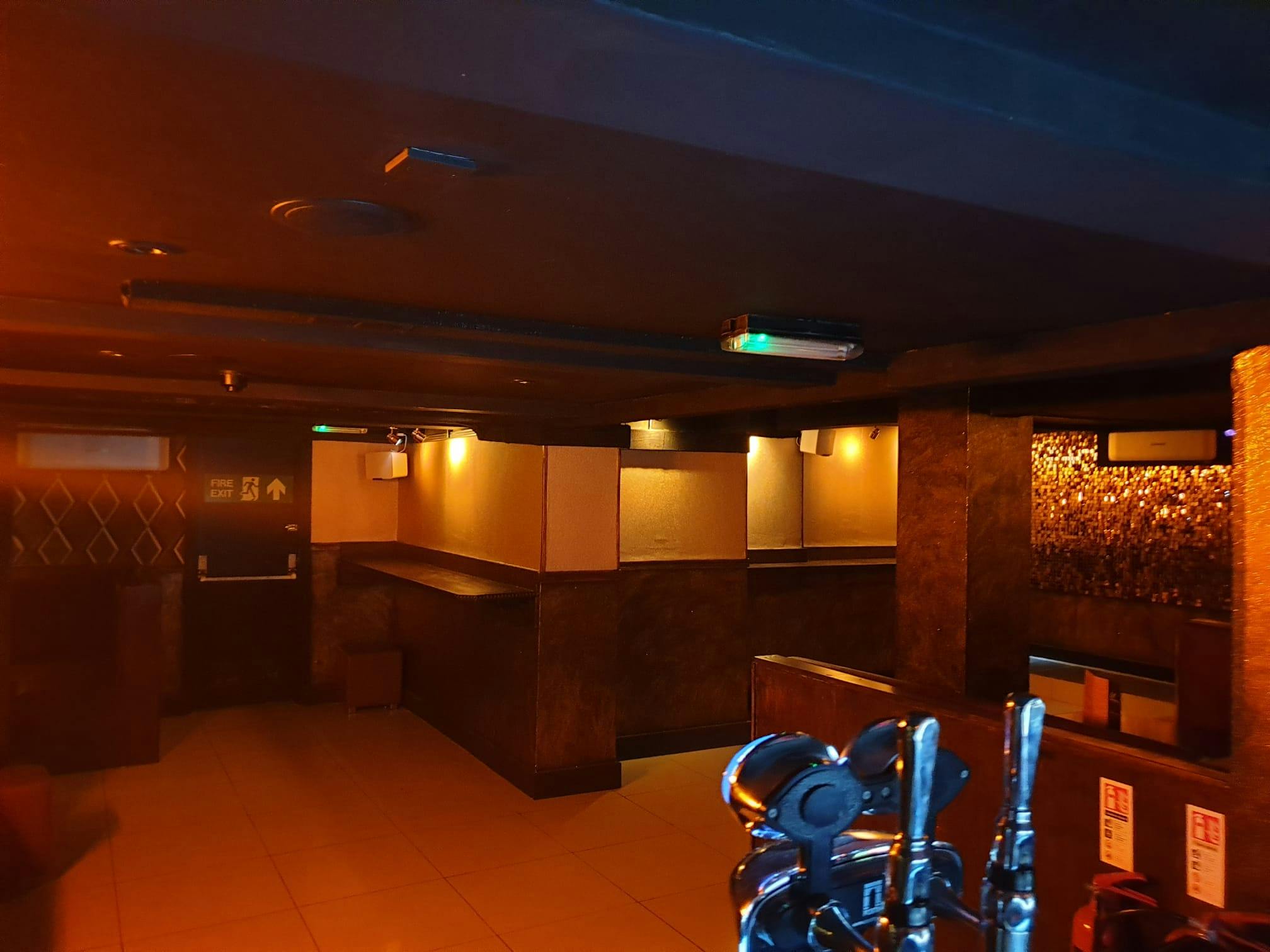 Miniature Restaurant event space with modern decor, perfect for networking and private gatherings.