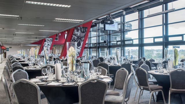 Cusack Suite in Croke Park, elegant dining setup for corporate events and celebrations.