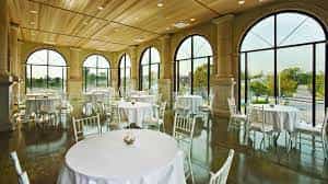 Hyatt Place East End event venue with elegant round tables and natural light.