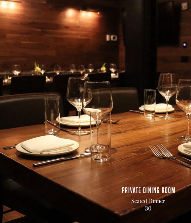 Private dining room at La Scarpetta with elegant table setup for corporate events.